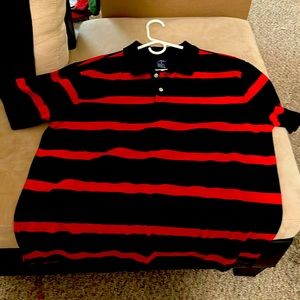 Black stripes along with red stripes Bugleboy polo shirt. Size: Large
